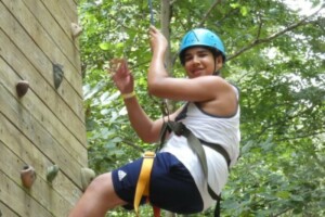 senior boy climbing